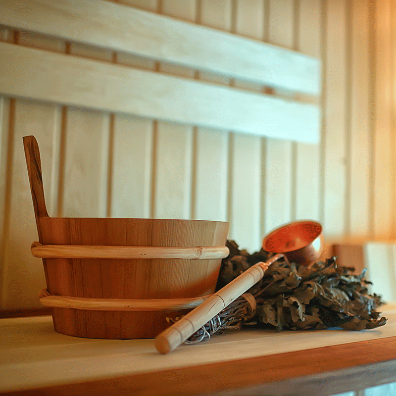 wooden-sauna-with-wood-pail-and-a-scoop