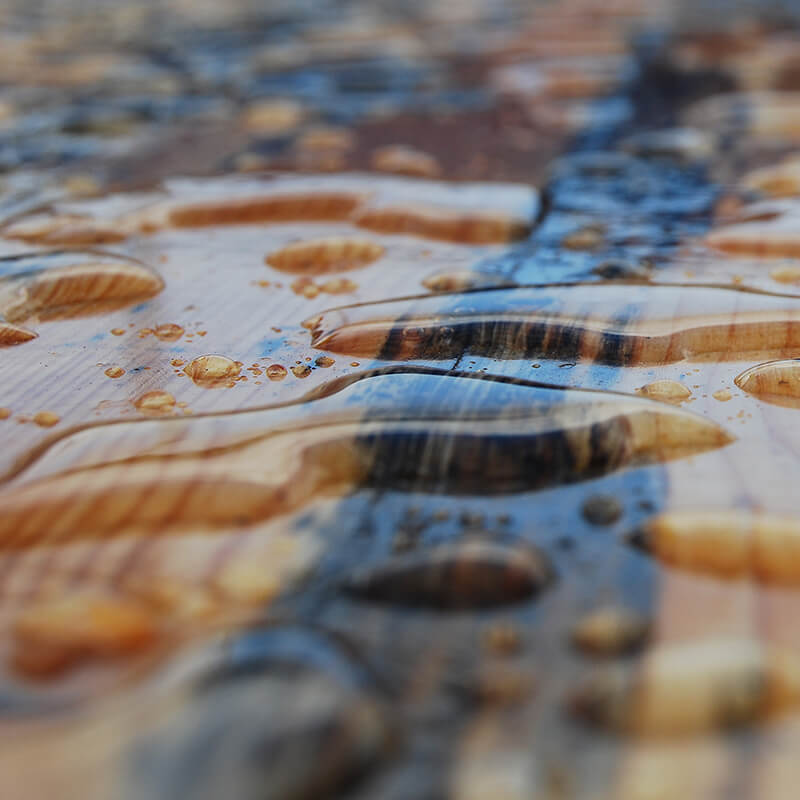water-drops-on-a-wooden-surface